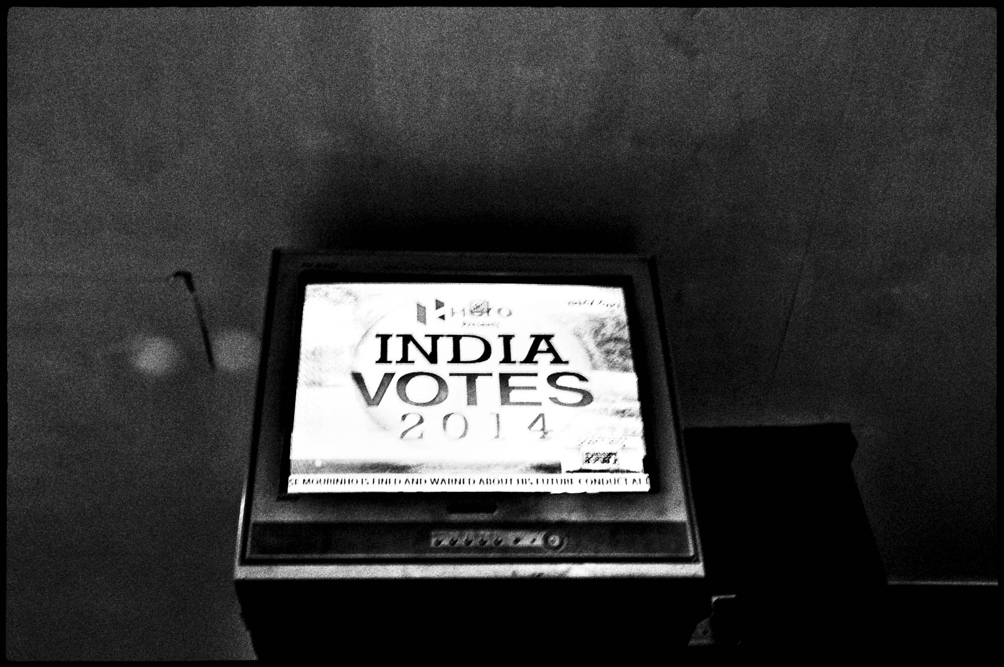 Television channel showing news inside a coffee shop in Kolkata